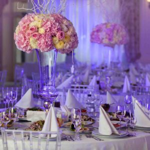 50877335 - table setting at a luxury wedding reception. beautiful flowers on the table.